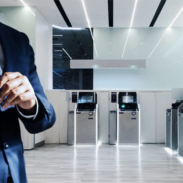 Bank manager and credit card in hand, business man standing confidently with pride in financial modern, futuristic, technology and banking network connection